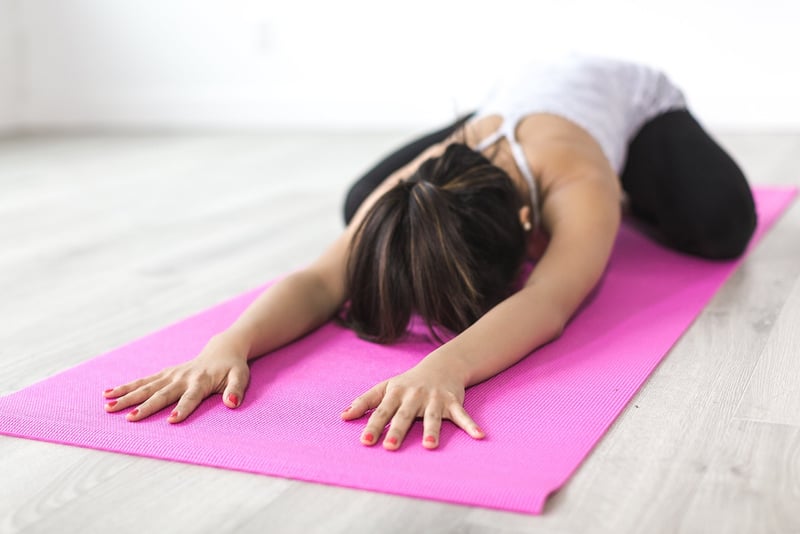 Woman practicing yoga and meditation